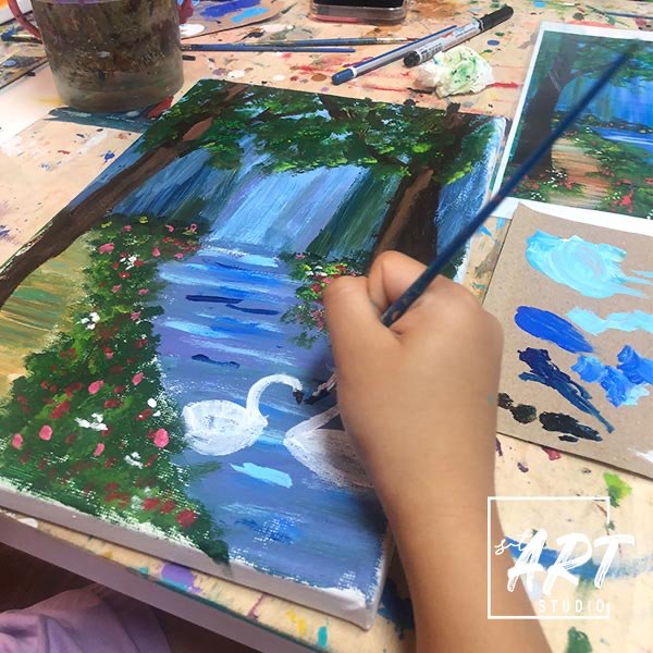 Child learning emotional regulation through creative art class at stART Studio Singapore
